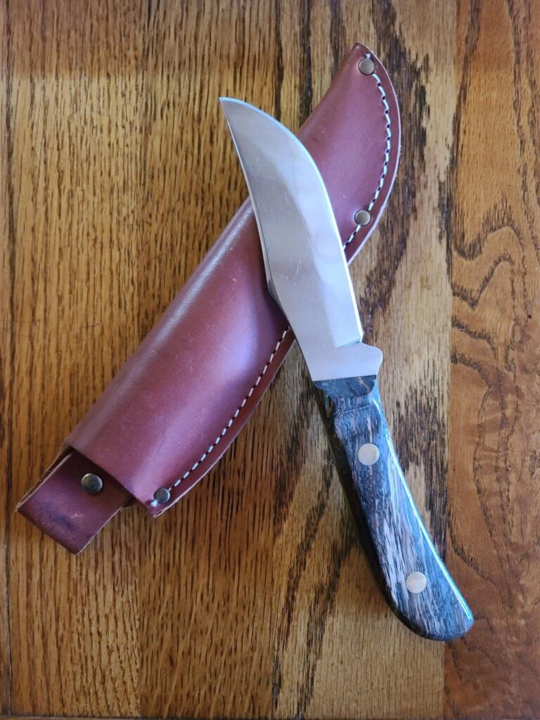 Queen 2009 Brown Wood Hunter 1 of 50 knives for sale