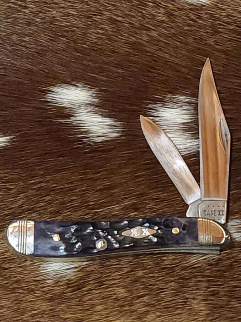 Case #31623 Purple Bone Standard Jigged Peanut knives for sale