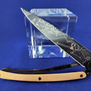 Deejo Tatoo: Earth black titanium coated blade with ski tattoo and Juniper handle knives for sale