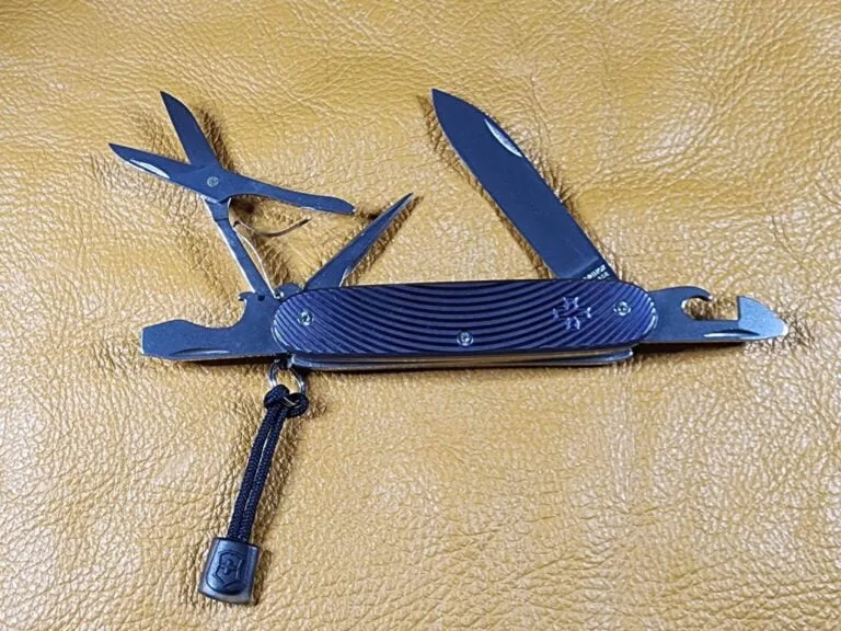 Custom Forge Custom Victorinox Pioneer X Titanium Meridians Anodized Blue Purple with Black Leather/Blue Stitching Slip and red Victorinox Pins knives for sale