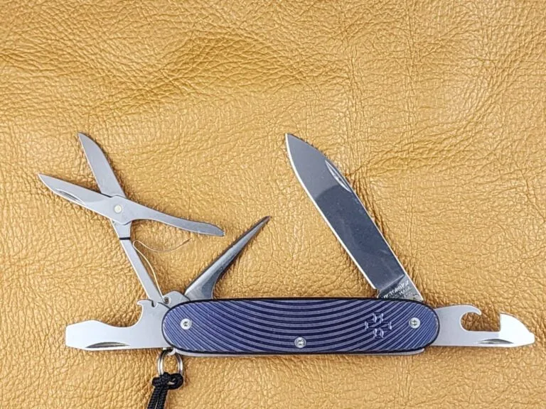 Custom Forge Custom Victorinox Pioneer X Titanium Meridians Anodized Blue Purple with Black Leather/Blue Stitching Slip and red Victorinox Pins knives for sale