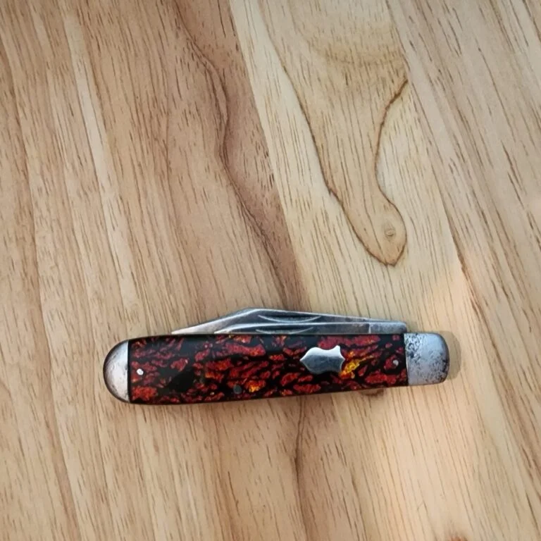 1920's Winchester #2111 with Steel Bolsters and Red Sparkle Scales. knives for sale