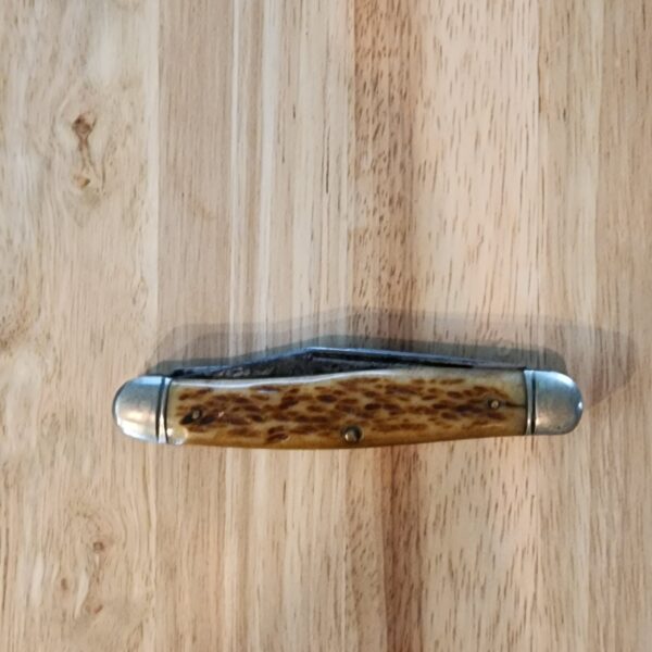 Vintage Kutmaster USA Peach Seed Jigged Bone Stockman