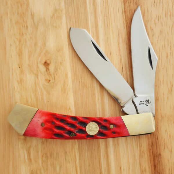 Frost Cutlery Daniel Boone Trapper in Red Jigged Bone and German Stainless Steel knives for sale