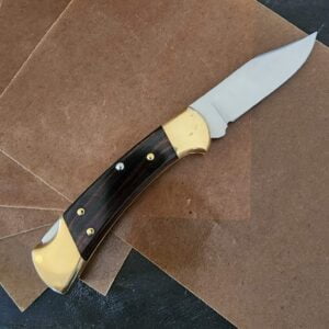 Buck 112 Ebony Lockback, with Leather Sheath knives for sale
