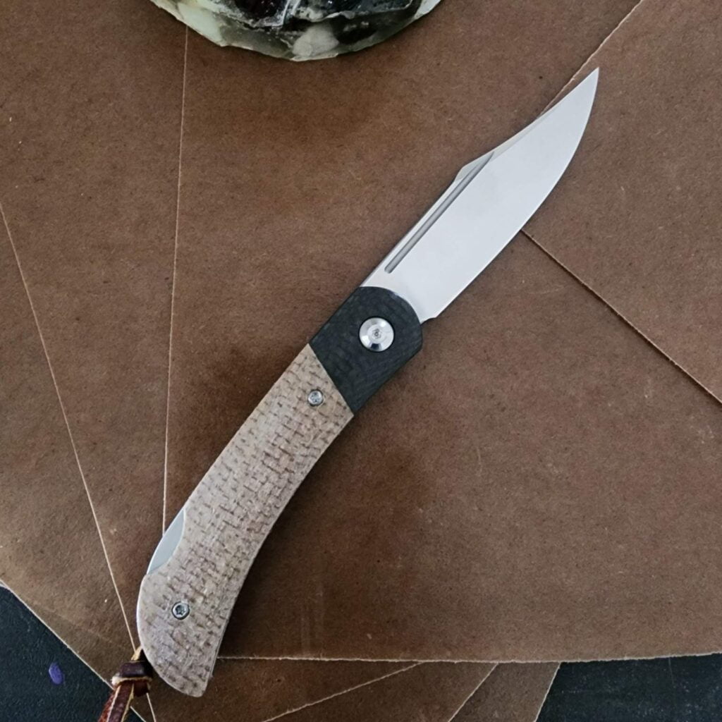 Civivi Rustic Gent with D2 steel, carbon fiber bolsters, and micarta ...