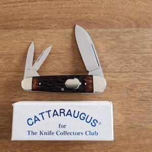 Cattaraugus / A.G. Russell Vintage Sleeveboard with Acorn inlay in Brown Jigged Bone CM14 knives for sale