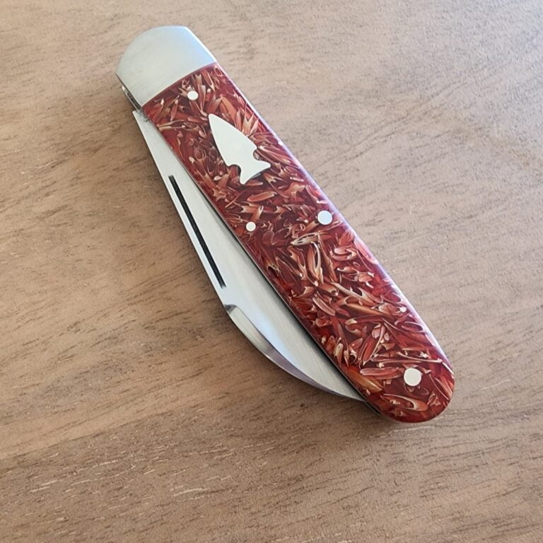 K'Roo Custom Hollow Ground Sleeveboard Wharncliffe in Red Seed Husk Resin Created April 2024 by W. O'Kelly knives for sale