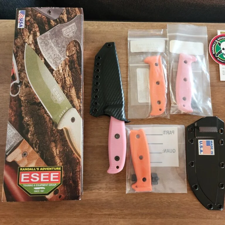 ESEE 4 in S35VN w/ 3 sets of g10 handles & hardware pink & orange. Custom Armatus Carry Solutions Sheath in carbon fiber style kydex included. knives for sale