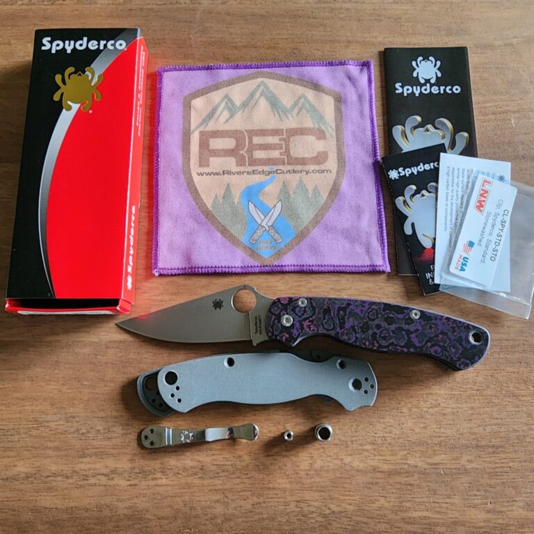 Spyderco PM2 with Maxamet blade steel, REC Exclusive Purple Haze Carbon Fiber scales with microfiber cloth, Rockscale Designs Titanium backspacer/lanyard tube, and LynchClip Titanium pocket clip. knives for sale