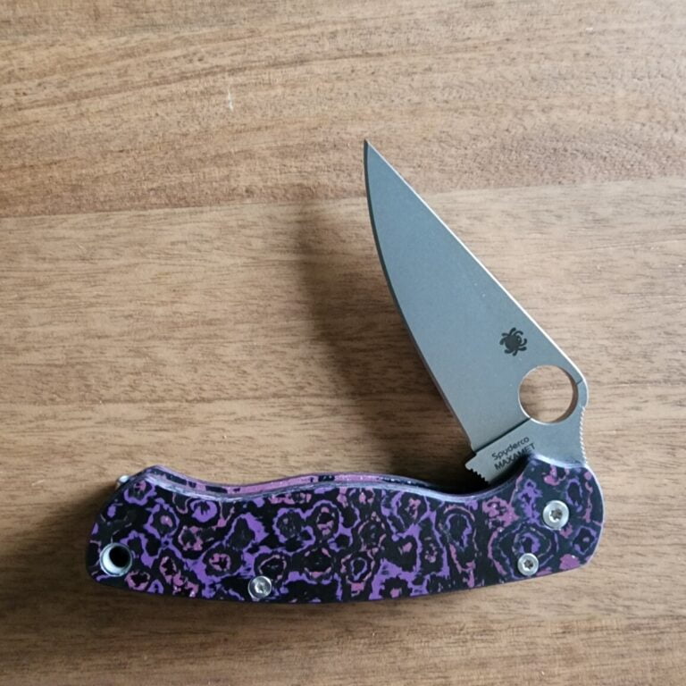 Spyderco PM2 with Maxamet blade steel, REC Exclusive Purple Haze Carbon Fiber scales with microfiber cloth, Rockscale Designs Titanium backspacer/lanyard tube, and LynchClip Titanium pocket clip. knives for sale