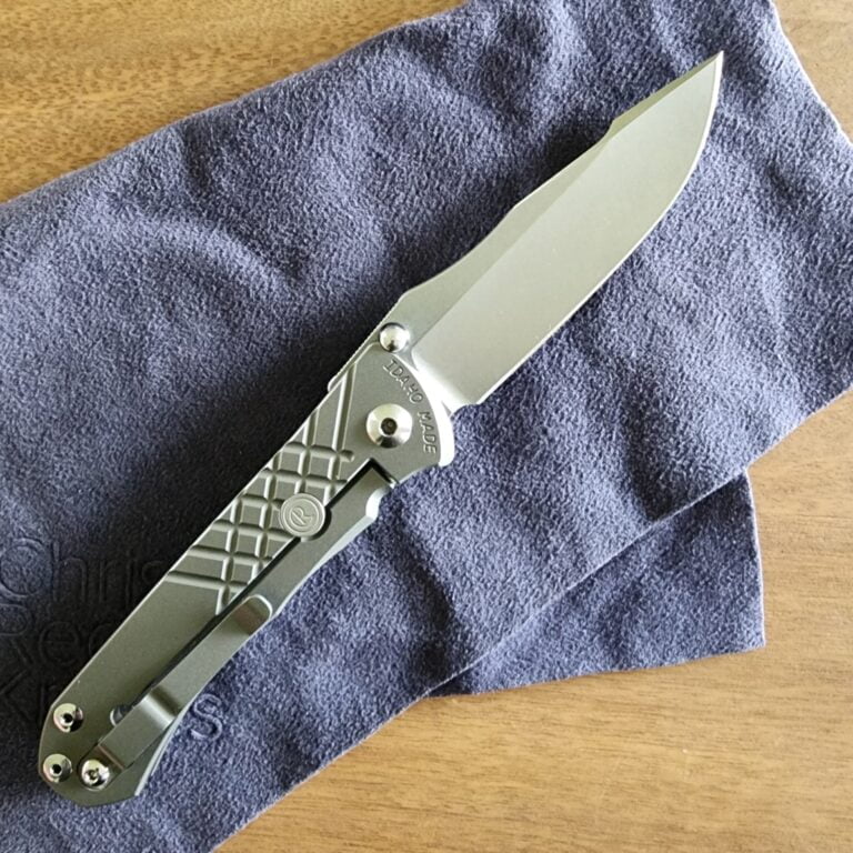 Chris Reeve Umnumzaan Titanium Folder CPM Drop point gently used knives for sale