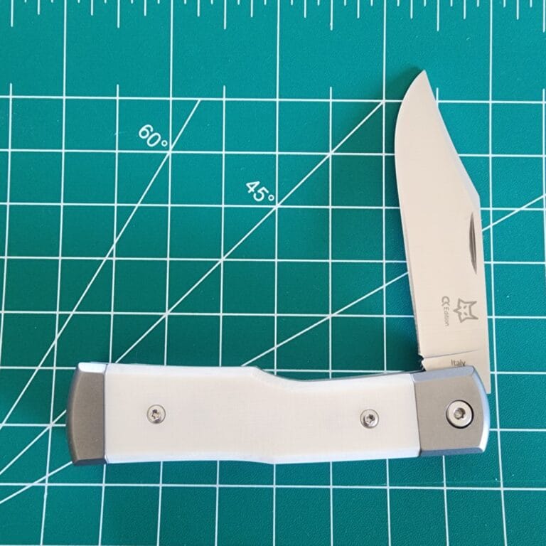 Fox Knives Gunstock in M390 W/ TI Bolsters and White Micarta Covers. knives for sale