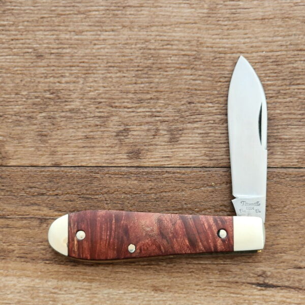 Daniels Family Knife Brands 2023 Titusville Little Man Jack Burnt Orange Burl 1 of 50