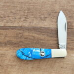 Cultured Artistry Collection Titusville Cutlery Co. Mammoth Mike Blue Crosscut Ivory Rybug 1 of 12 a production of Daniels Family Knife Brands knife for sale
