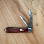 1920's Winchester #2111 with Steel Bolsters and Red Sparkle Scales. knife for sale