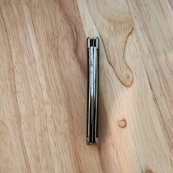 1920's Winchester #2111 with Steel Bolsters and Red Sparkle Scales. knives for sale