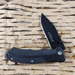 Camillus Frame Lock folder with belt clip previously owned knives for sale