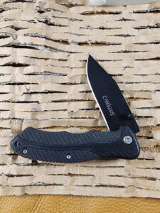 Camillus Frame Lock folder with belt clip previously owned knives for sale