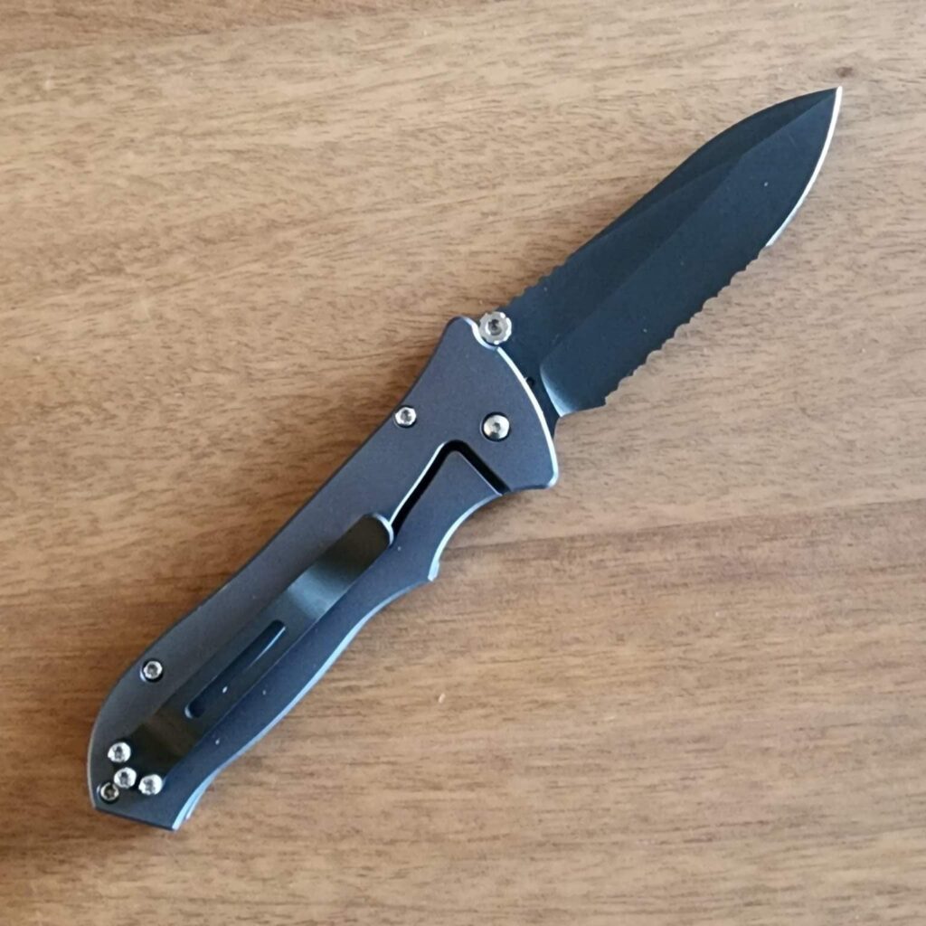 Paragon Knives USA "MOD" Master of Defense Frame Lock Aluminum Silver/Black Partially Serrated Point Man – gallery image 2