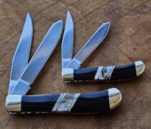 Pair of Premiun Select Rough Rider small and medium trappers knives for sale