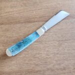 Titusville TSA Exclusive Mermaid Blue Giraffe Bone Big Easy Cotton Sampler 1095 Carbon W/ Long Pull 1 of 6 knife for sale