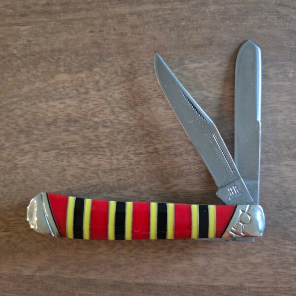 Rough Rider Trapper in Red Black and Yellow Synthetic