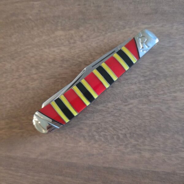Rough Rider Trapper in Red Black and Yellow Synthetic