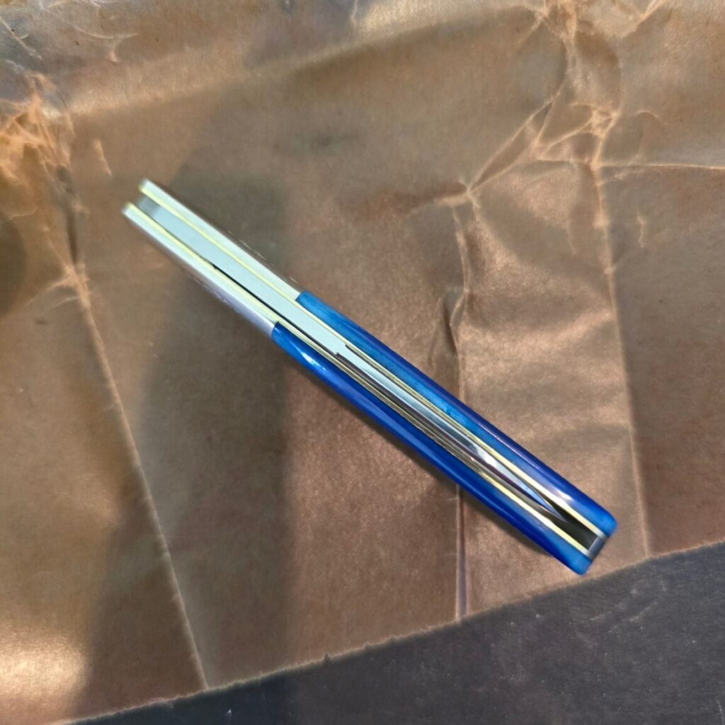 Great Eastern Cutlery #863125 SS Navy Blue Sawcut Bone very gently used knife for sale