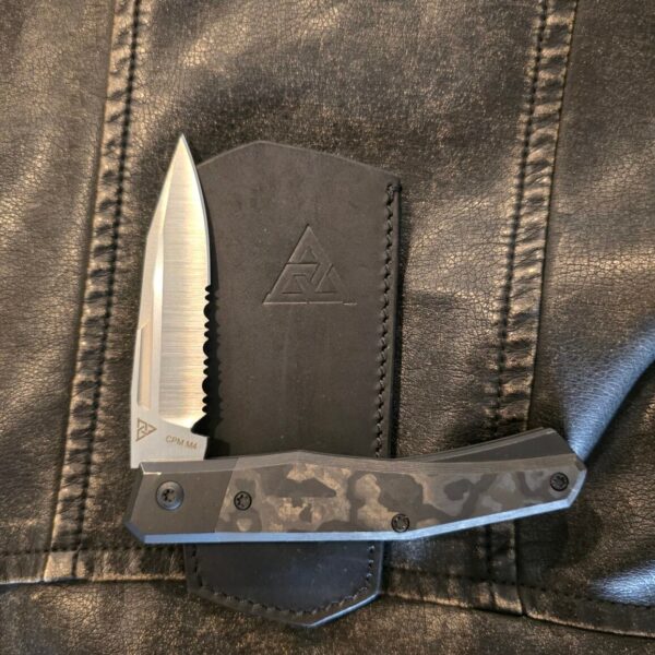 Suprlativ Infidel in Titanium Black PVD/ Black Camo Fat Carbon and M4/ Serrated Belt Satin