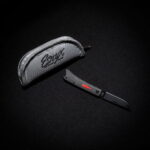 Esnyx BEER BUSTER JR. FRONT FLIPPER M390 Black PVD Finish Blade Handle: Black PVD Titanium, Black Micarta Handle with a Red G10 Bottle, Mokuti Clip knife for sale
