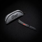 Esnyx BEER BUSTER JR. FRONT FLIPPER M390 Black PVD Finish Blade Handle: Black PVD Titanium, Black Micarta Handle with a Red G10 Bottle, PVD Clip knife for sale