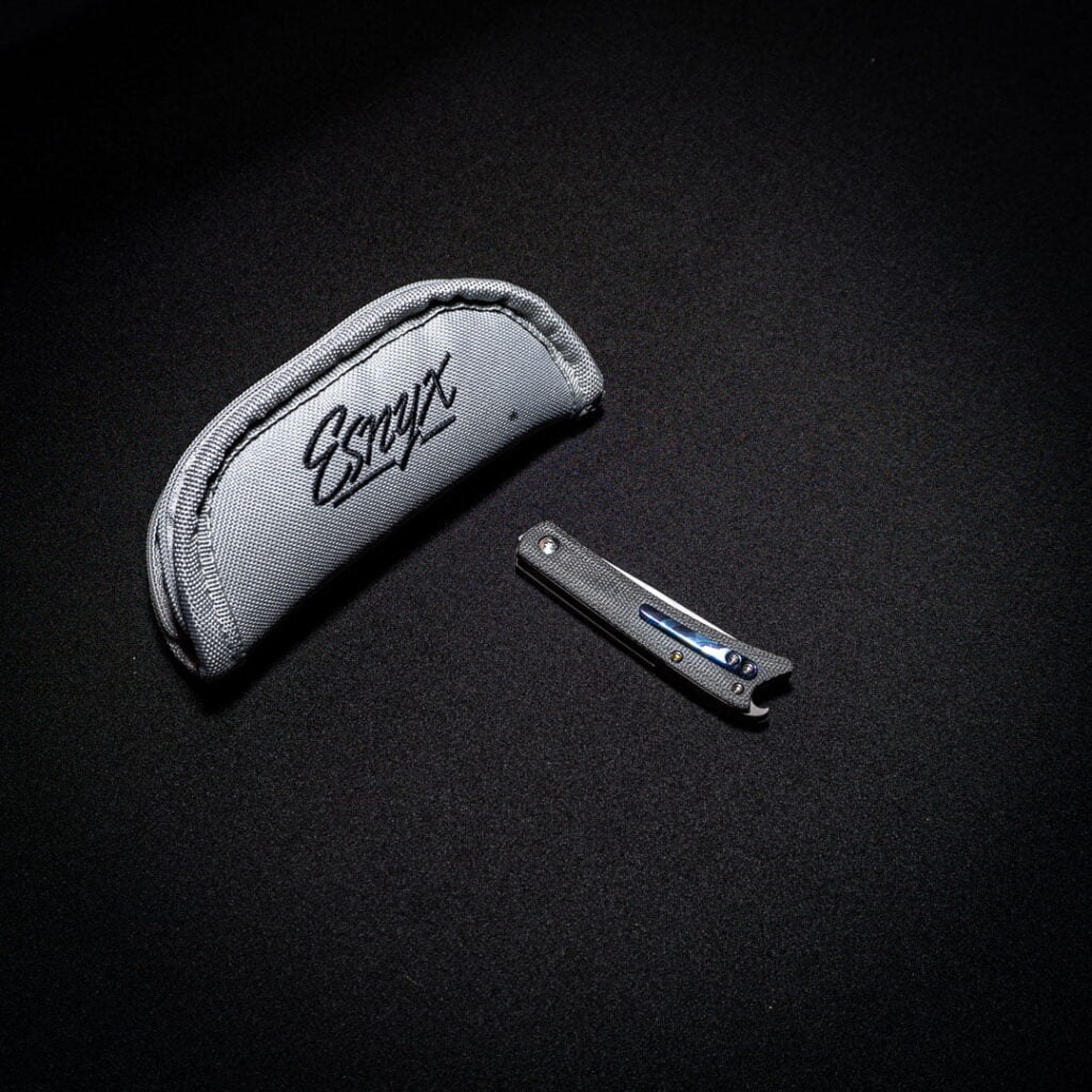 Esnyx BEER BUSTER JR. FRONT FLIPPER M390 Hand Rubbed Satin Finish Blade Handle: Bead Blast Titanium, Black Micarta Handle with a Blasted Titanium Bottle Inlay, Mokuti Clip – gallery image 3