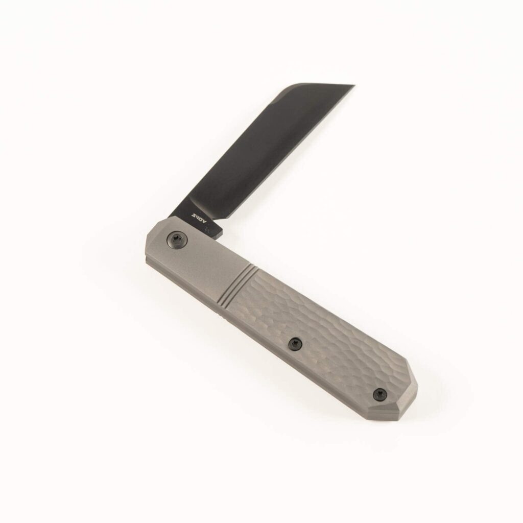 MIDNIGHT JACK - TITANIUM JIGGED REVERSE TUX knife for sale