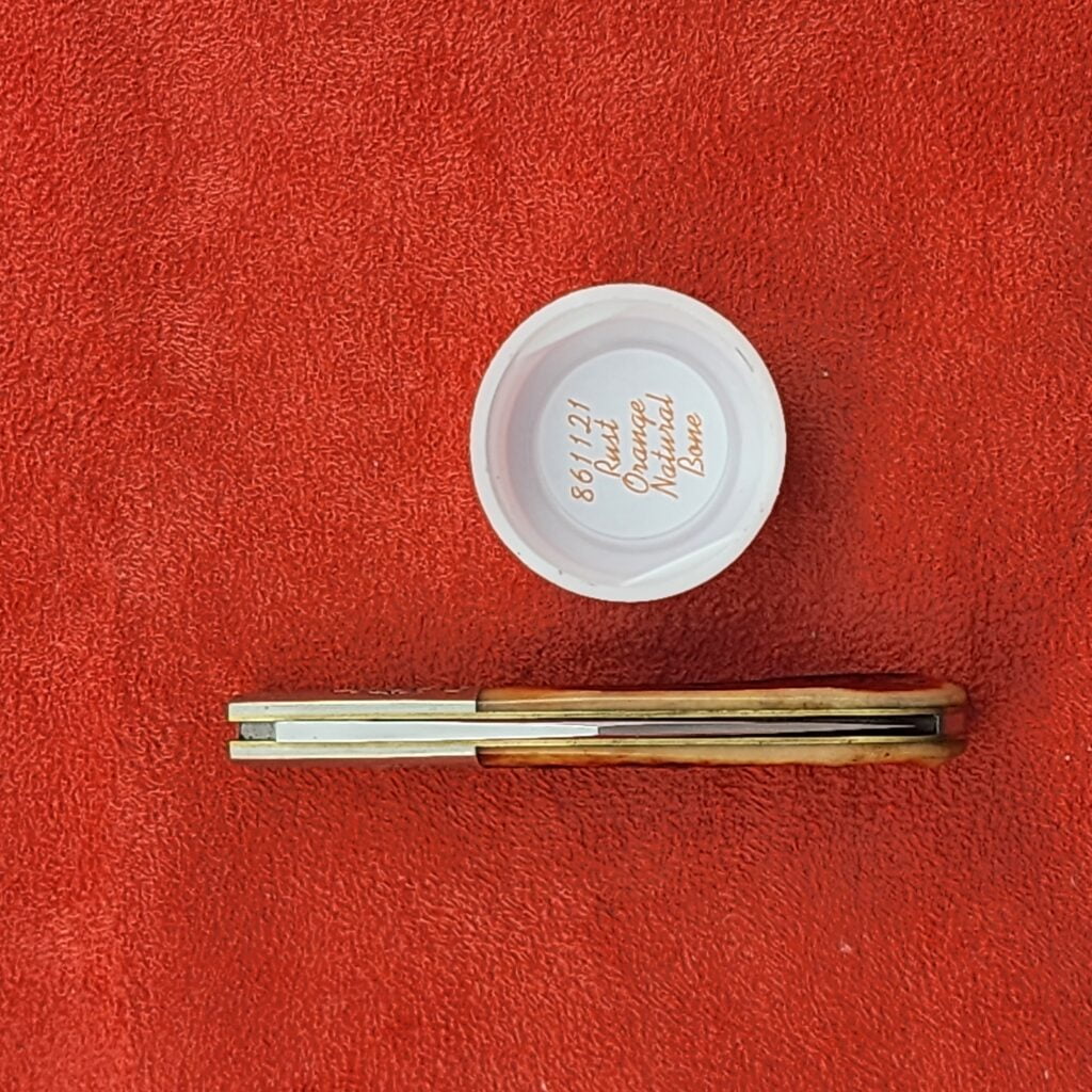 GEC #861121 Rust Orange Natural Bone knife for sale