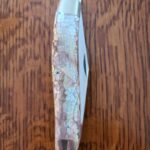 AG Russell Jumbo Muskrat Chipped Pearl knife for sale