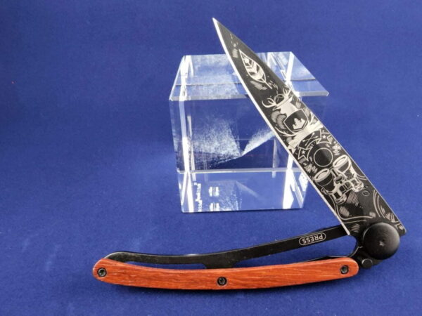 Deejo Tatoo: Earth black titanium coated blade with wilderness tattoo and Coralwood handles - Image 3