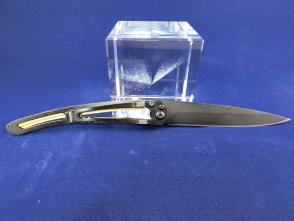 Deejo Tatoo: Earth black titanium coated blade with ski tattoo and Juniper handle - Image 3