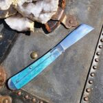 Titusville TSA Exclusive Mermaid Blue Giraffe Bone Big Easy Cotton Sampler 1095 Carbon W/ Long Pull 1 of 6 knife for sale