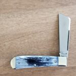Titusville TSA Exclusive Lone Wolf Giraffe Bone Big Easy Cotton Sampler 1095 Carbon W/ Long Pull 1 of 6 knife for sale