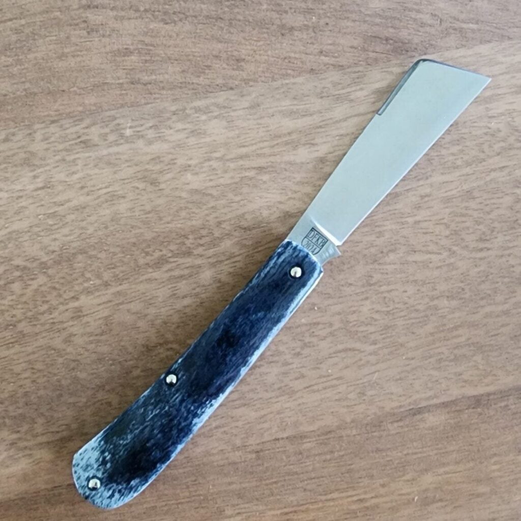 Titusville TSA Exclusive Lone Wolf Giraffe Bone Big Easy Cotton Sampler Shadow Pattern 1095 Carbon W/ Long Pull 1 of 6 knife for sale