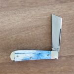 Titusville TSA Exclusive Olympic Blue Giraffe Bone Big Easy Cotton Sampler 1095 Carbon W/ Long Pull 1 of 6 knife for sale