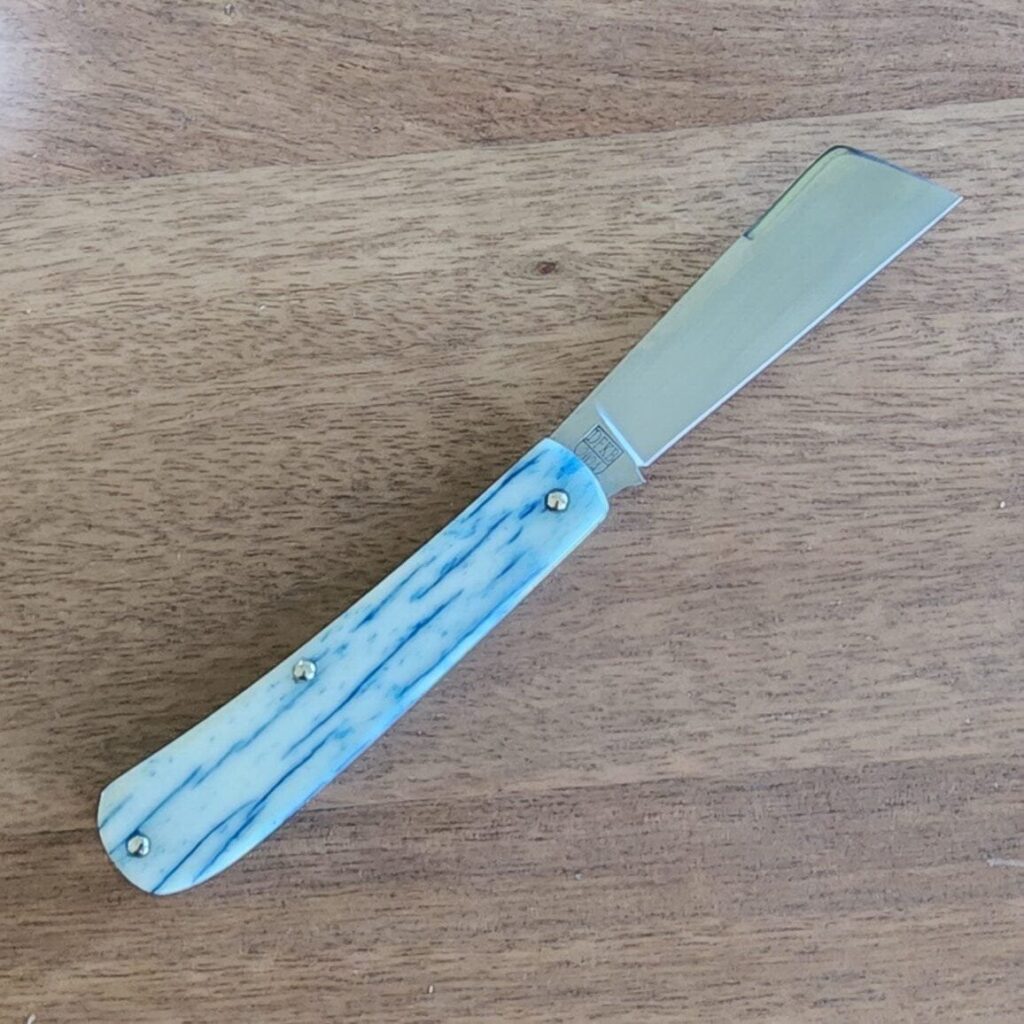 Titusville TSA Exclusive Olympic Blue Giraffe Bone Big Easy Cotton Sampler Shadow Pattern 1095 Carbon W/ Long Pull 1 of 6 knife for sale