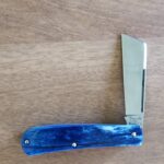 Titusville TSA Exclusive Olympic Blue Giraffe Bone Big Easy Cotton Sampler Shadow Pattern 1095 Carbon W/ Long Pull 1 of 6 knife for sale