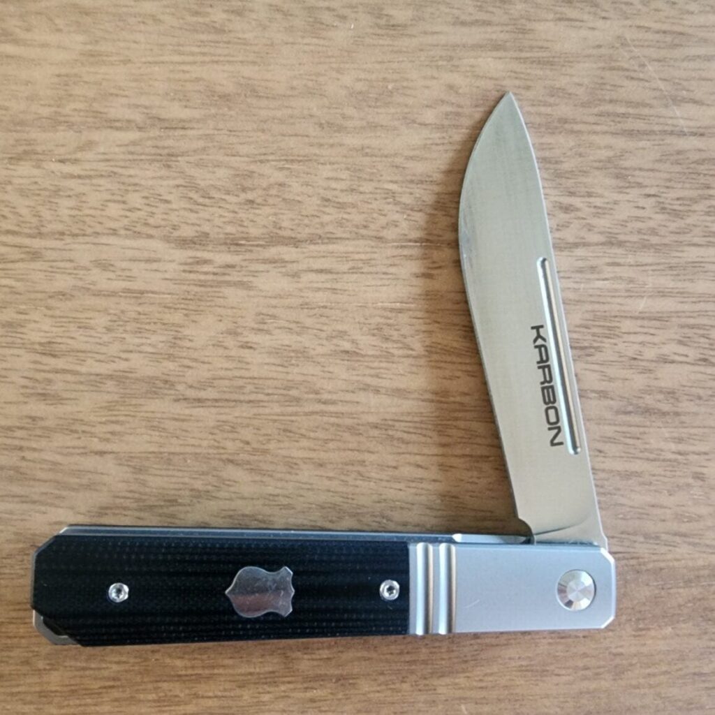 Karbon Knives By Ken Onion Flatline Frame Lock in 154CM Stainless and Black G10 knife for sale