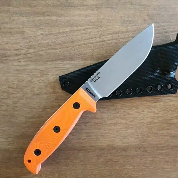 ESEE 4 in S35VN w/ 3 sets of g10 handles & hardware pink & orange. Custom Armatus Carry Solutions Sheath in carbon fiber style kydex included. – gallery image 1