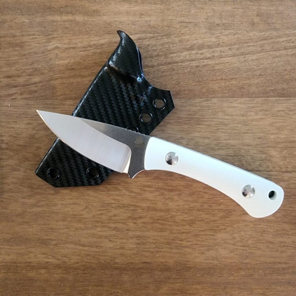Twisted Assisted Gambler in S35VN w/ 2 sets of g10 handles (white & black) & Custom Armatus Carry Solutions Sheath in carbon fiber style kydex knife for sale