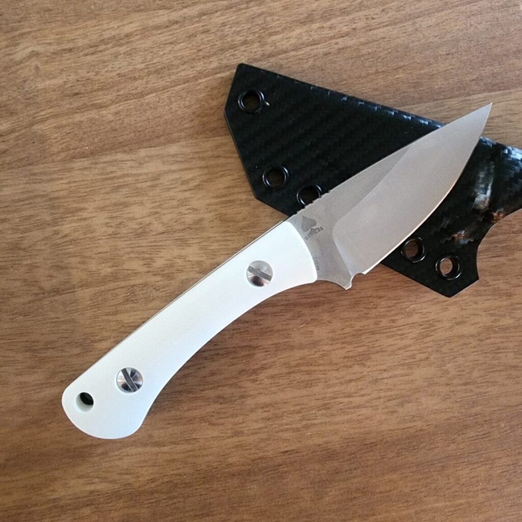 Twisted Assisted Gambler in S35VN w/ 2 sets of g10 handles (white & black) & Custom Armatus Carry Solutions Sheath in carbon fiber style kydex knife for sale