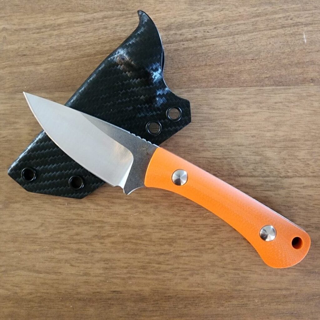 Twisted Assisted Gambler in 14C28N w/ 2 sets of g10 handles (OD green & orange) & Custom Armatus Carry Solutions Sheath in carbon fiber style kydex – gallery image 5