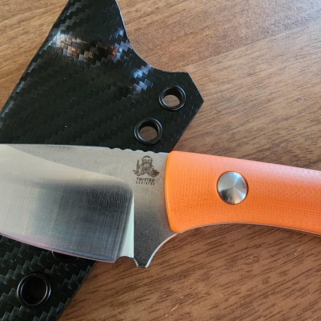 Twisted Assisted Gambler in 14C28N w/ 2 sets of g10 handles (OD green & orange) & Custom Armatus Carry Solutions Sheath in carbon fiber style kydex – gallery image 3
